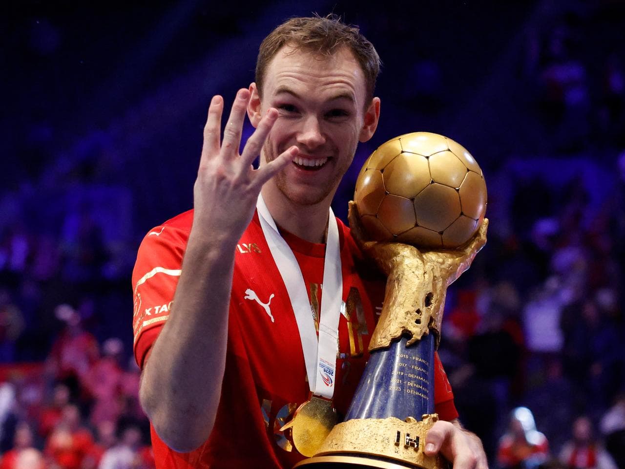 Mathias Gidsel with the World Championship trophy